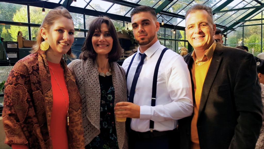 An endearing photo capturing the warmth of togetherness, featuring my beloved family members gathered around, sharing genuine smiles and affectionate moments. Parents, siblings, and generations united, radiating happiness and love in a heartwarming family portrait